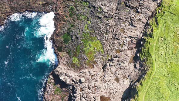 Wild Shoreline Aerial view.Overhead Aerial View of Ocean Waves Crashing on Rocky Coast. Aerial View