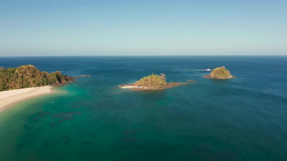 Wide Tropical Beach with White Sand View From Above