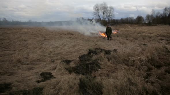 Aerial View of Dry Grass Burning on the Farmland