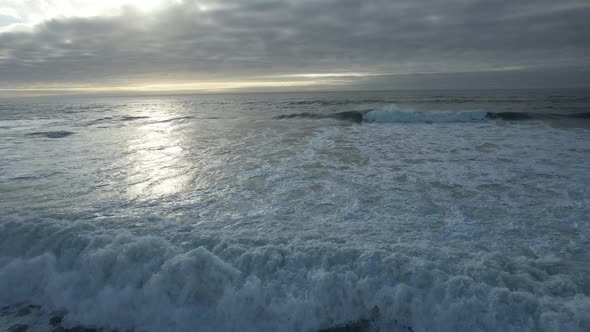 Stormy waves of Ocean crashing into the water