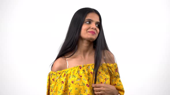 Shy Indian girl trying to impress someone