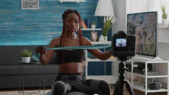 Trainer Slim Black Woman Recoring Online Yoga Training Using Videocamera