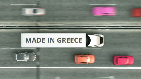 Modern Trucks with MADE IN GREECE Text on the Road