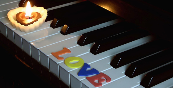Love on Piano Keys and Candle Light