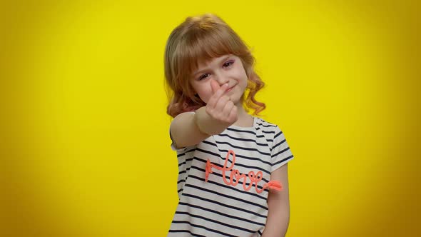 Romantic Smiling Little Kid Child Girl Sending Lots of Air Kisses Looking at Camera and Smiling