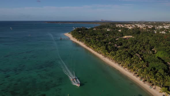 Beach Along the Waterfront and Coral Reef and Palm Trees, Mauritius, Africa, Pier Near the Beach of