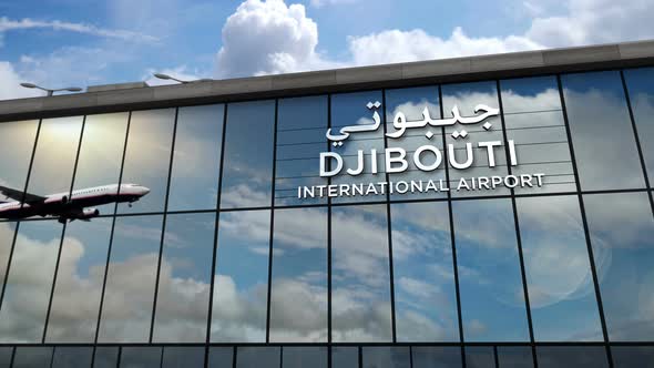 Airplane landing at Djibouti Jibuti airport mirrored in terminal