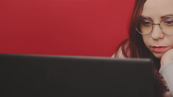 Young Woman Using Laptop in Studio