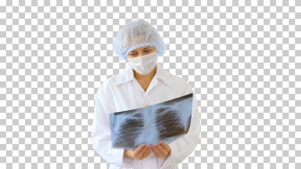 Female doctor wearing medical mask looking, Alpha Channel