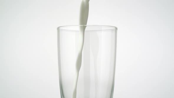 Pouring milk into glass, Slow Motion