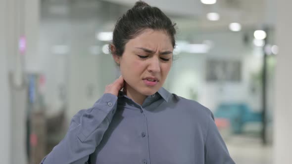 Portrait of Young Indian Woman Having Neck Pain