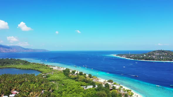 Aerial above seascape of tropical tourist beach time by blue lagoon with white sand background of jo