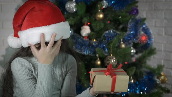 Child expressing disappointment for present.