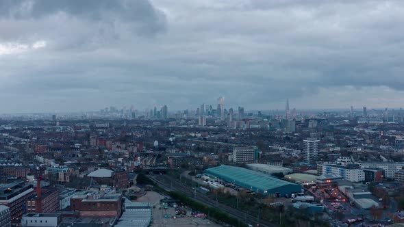 Aerial drone slider shot towards central London skyline from up market residential buildings