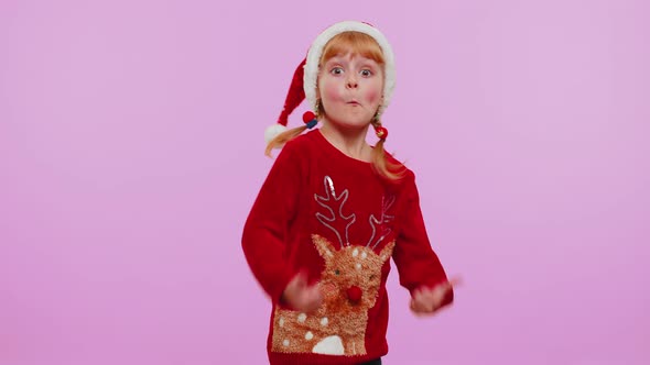 Funny Girl in Red New Year Sweater Raises Thumbs Up Agrees Something Good Like Violet Background