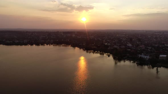 Cityline, Roads And Lake On Sunset