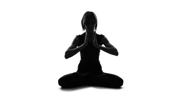 Sport Woman Making Namaste Gesture and Meditating in Lotus Pose, Yoga Balance