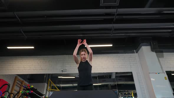 Wellness Sports Female Performs Explosive Jumps on the Bench Coordination Training Crossfit Training