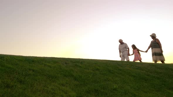 Girl and Grandparents, Sunset Sky.