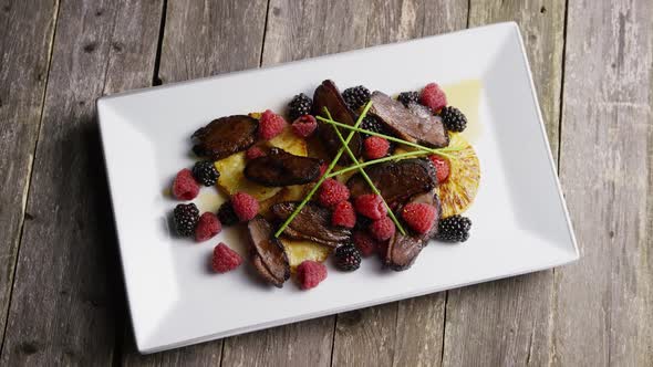 Rotating - smoked duck bacon with grilled pineapple, raspberries, blackberries and honey