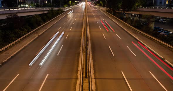 Time lapse of cars driving on a highway at night in 4k