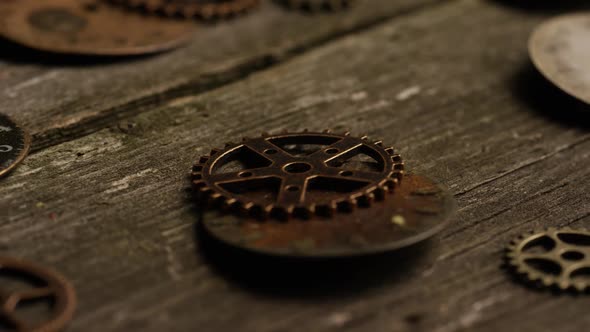 Rotating stock footage shot of antique and weathered watch faces 