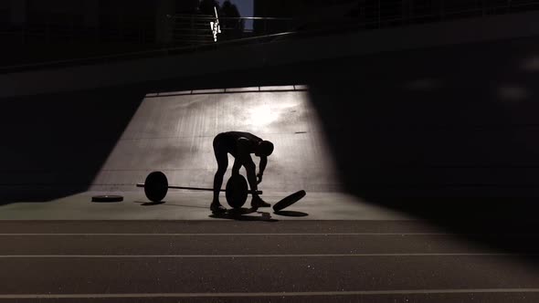 Handsome Bodybuilder Guy Prepare to Do Exercises with Barbell