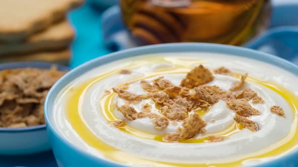 Yogurt with Granola and Honey Bowl of Fresh and Healthy Breakfast