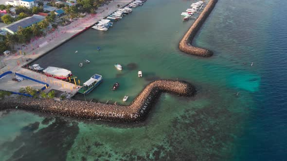 Aerial of Maldives dock to city