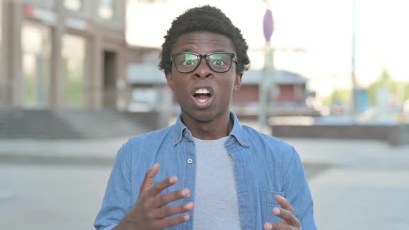 Wondering Young African Man Shocked By Loss Outdoor