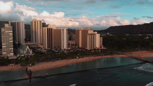 Aerial drone footage of Honolulu, Hawaii. Beautiful real estate, buildings in the city. Palm trees