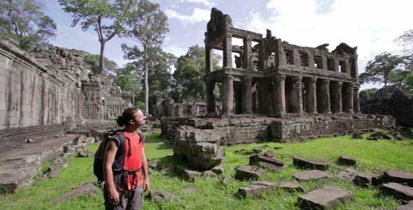 Man Walking In Angkor Wat Temple