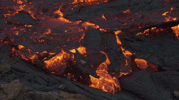 Incandescent lava flows under earth crust. Static view