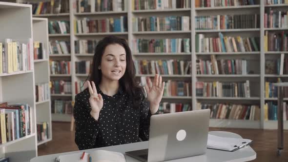 Young Woman Student Remote Worker Learning Watching Online Webinar Webcast Class Looking at Laptop