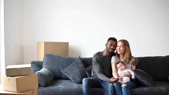 Happy Multiracial Family Moved in a New House