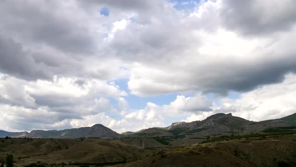 Mountain Landscape. Clouds Float Across the Blue Sky