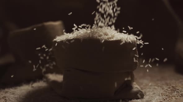 Rice is Falling on Burlap in Slow Motion