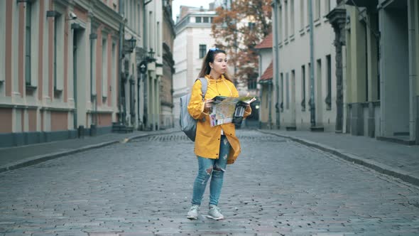 City Street with a Female Tourist Taking a View of It