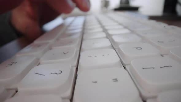 Closeup Moving Macro Shot Man Hands Typing on Laptop Keyboard Working on Internet Project at Light