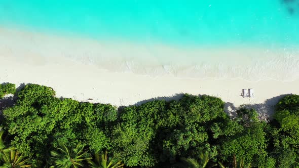 Aerial view travel of beautiful coastline beach break by aqua blue ocean and white sandy background 