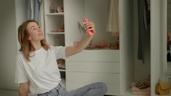 Mom Sits Taking a Selfie and Twin Daughters Run Up to Her