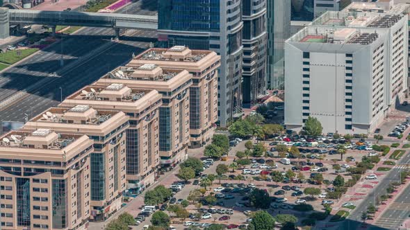 Aerial View to Parking Lot Outdoors Vehicles in Dubai Downtown Timelapse