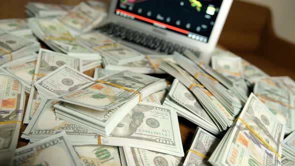 Lots of Money and Computer alt