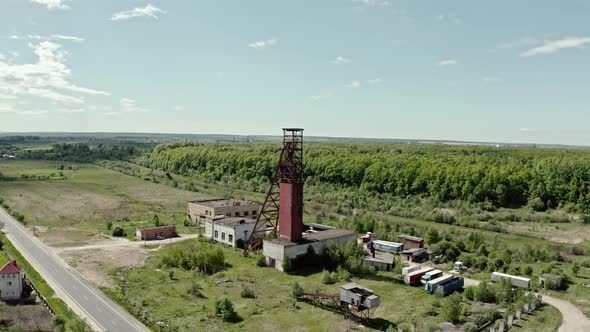 Aerial Wiev: Old Abandoned Salt Mine Against the Background Forest Wide Shot