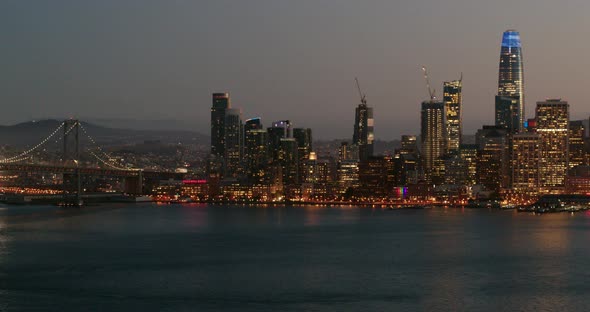 San Francisco Skyline and Oakland Bay Bridge at Dusk Aerial