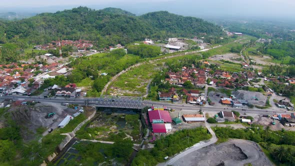 Kaliputih bridge over dry riverbed in Muntilan, Indonesia, Java aerial panorama