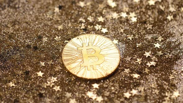 Light Ray Moves Above Bitcoin on Golden Sand Macro