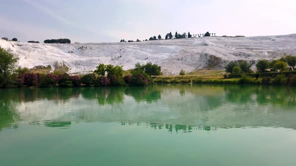 Elevating shot of Pamukkale, meaning "cotton castle" which is a natural site in Denizli in the south