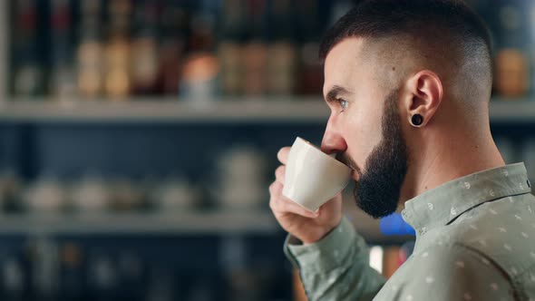 Face of Reflective Guy Enjoy Fragrance Tea at Catering Restaurant