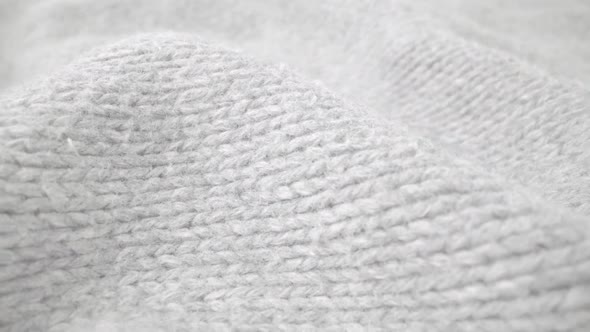 Extreme Detail View of Sheep Wool Cloth Texture Flowing in Macro Dolly Shot